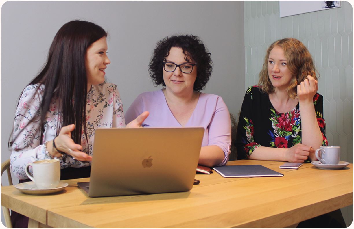 Our team at a table discussing a new project.